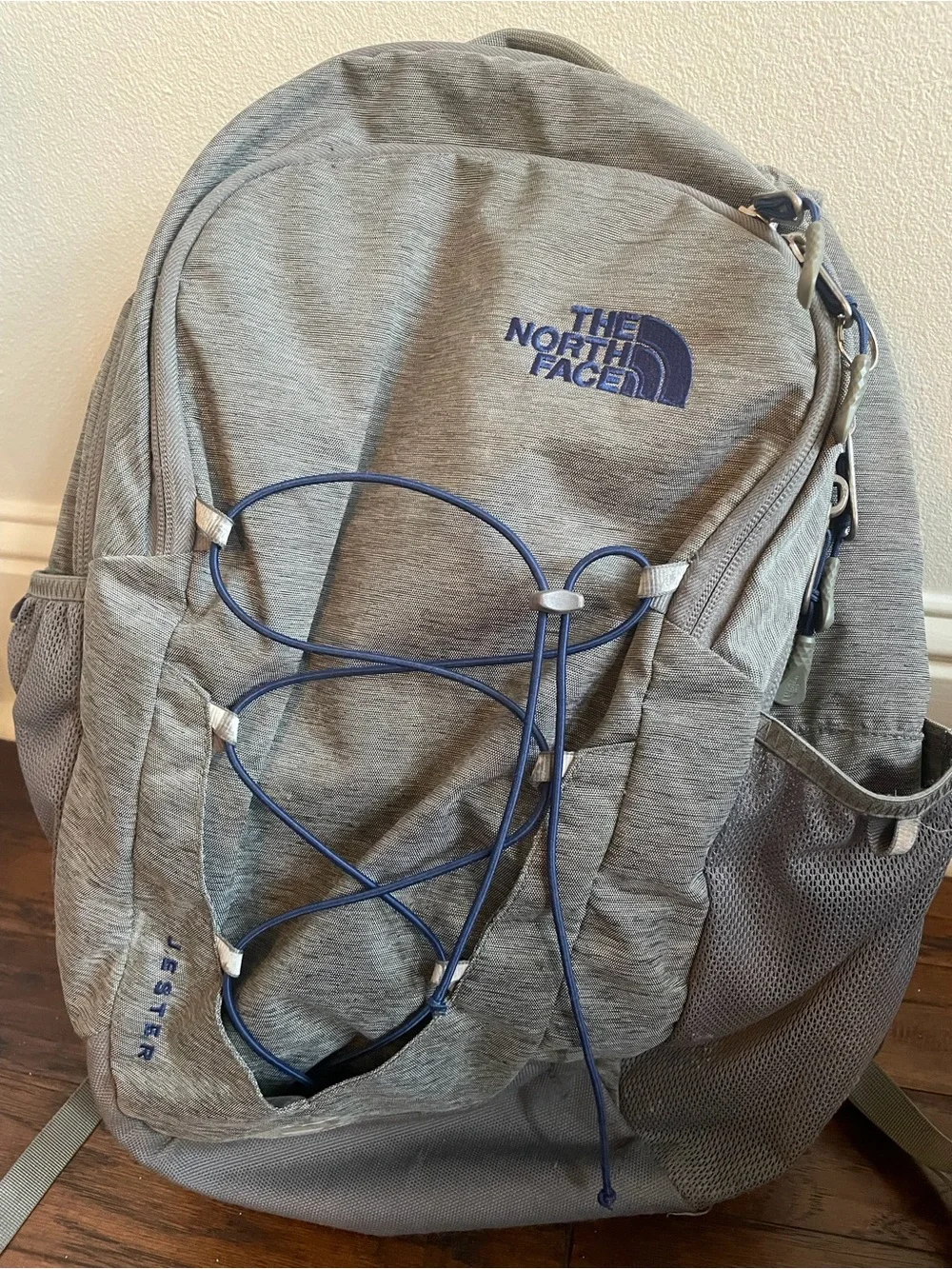 The North Face Gray Backpack with Blue Bungee Cord